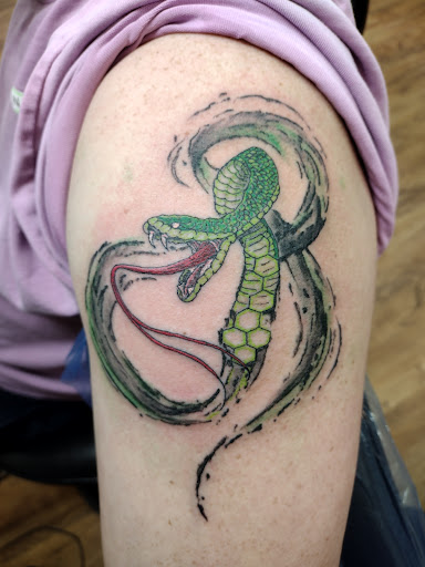 Explore us navy tattoo ideas, creative tattoo ideas in Park Hills, available at Sideshow Tattoo and Piercings