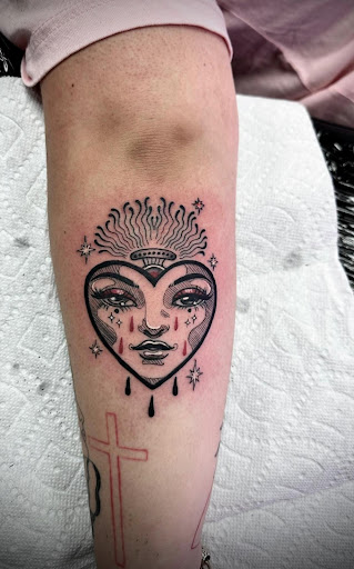 Explore religious tattoo ideas for guys, creative tattoo ideas in Fort Myers, available at Loyal 2 The Coil Tattoos & Piercings (Edison Mall Location Entrance F)