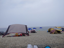 Foto von Naa Beach und die siedlung