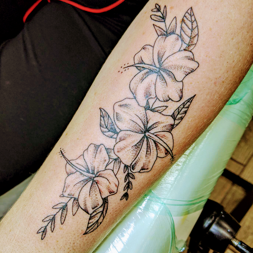Explore letter tattoo cover up ideas, creative tattoo ideas in Buford, available at Wild Tribe Tattoos and Piercings