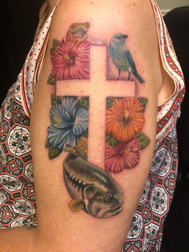 Explore outdoorsman tattoo ideas, creative tattoo ideas in Englewood, available at Point of Entry Tattoo