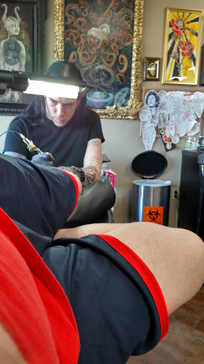 Explore lower back tattoo cover up ideas, creative tattoo ideas in Chesterfield, available at St. Louis Tattoo Company