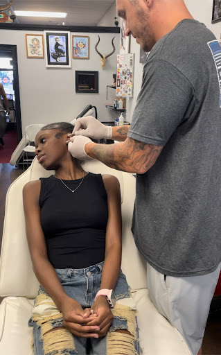 Explore wolf pack tattoo ideas, creative tattoo ideas in Loganville, available at No Regrets Tattoo Studio