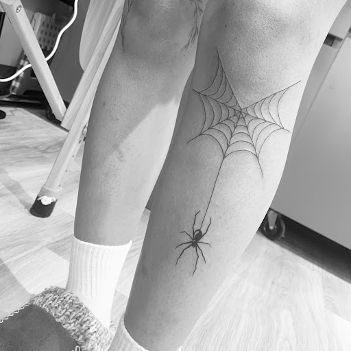 Explore dachshund tattoo ideas, creative tattoo ideas in Fairfax, available at Pinky Inky Tattoo