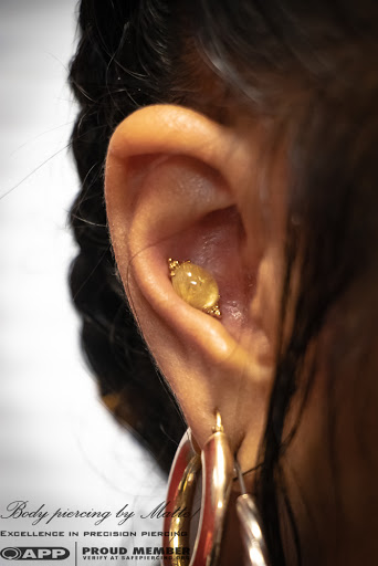 Explore gravestone tattoo ideas, creative tattoo ideas in Fairfield, available at Alpha-Omega Tattoos and Body Piercing
