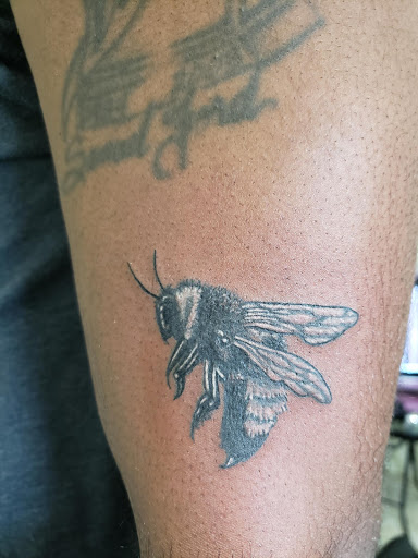 Explore thigh tattoo ideas for women, creative tattoo ideas in Warren, available at Dark Horse Tattoo Co. LLC.