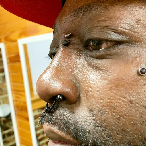 Explore ring tattoo ideas for couples, creative tattoo ideas in Summerville, available at Exotic Impressions Body Piercing