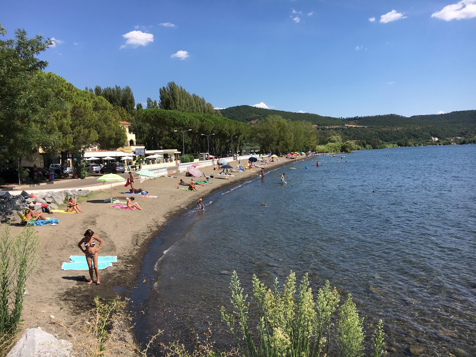Foto von Spiaggia Il Guadetto mit brauner sand Oberfläche