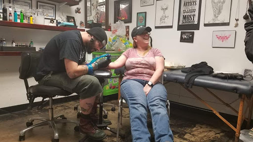 Explore bridge tattoo ideas, creative tattoo ideas in Oklahoma City, available at Skin Addiction Tattoo Studio