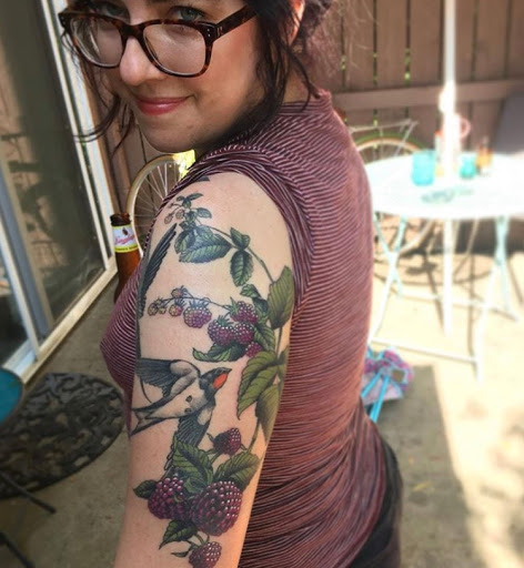 Explore blacked out tattoo ideas, creative tattoo ideas in Lawrence, available at Standard Electric Tattooing
