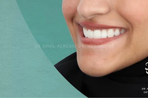 Dr Amal Alkebsi د أمل الكبسي لتقويم الاسنان والفكين / تقويم الانفزلاين Invisalign Certified Orthodontist/ MClinDent in Orthodontics image