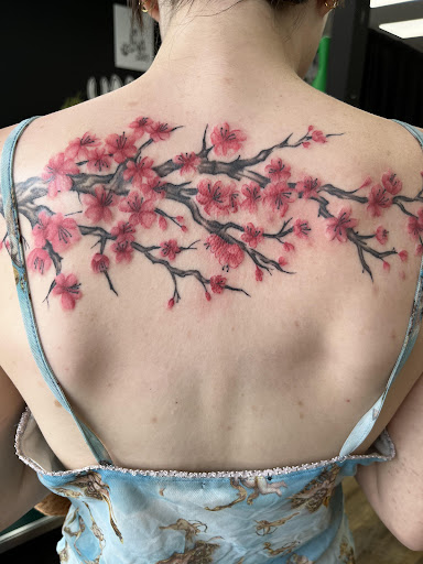 Explore bone tattoo ideas, creative tattoo ideas in Springfield, available at Nuclear Crayon Tattoo & Piercing