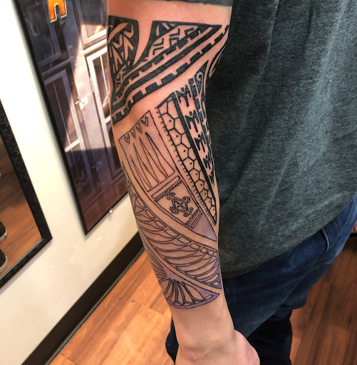 Explore rib cage tattoo ideas for guys, creative tattoo ideas in Alamosa, available at The Shop Tattoo & Comics