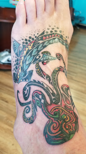 Explore skull tattoo ideas for women, creative tattoo ideas in Muncie, available at Abandon all hope tattoo and body piercing