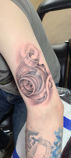 Explore illuminati tattoo ideas, creative tattoo ideas in Stetsonville, available at Solace Ink Company LLC