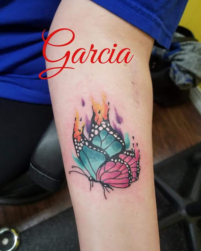 Explore wildflower tattoo ideas, creative tattoo ideas in Kearney, available at Ink Shop Tattoos & Piercings