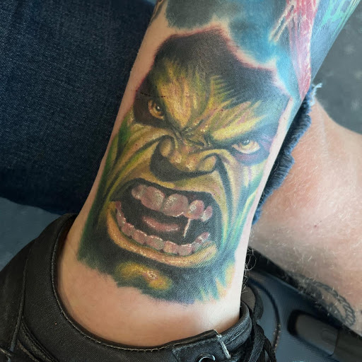 Explore mens upper arm tattoo ideas, creative tattoo ideas in Lake Villa, available at Eternal Tiger Tattoo