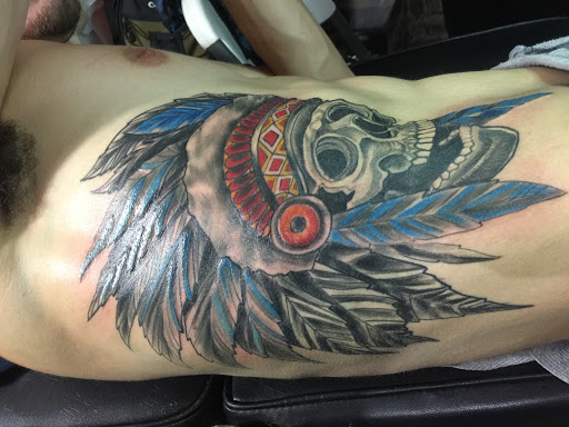 Explore half sleeve mens tattoo ideas, creative tattoo ideas in Dover, available at Walls of Wonder Tattoo And Body Piercing