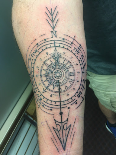 Explore upper back tattoo ideas male, creative tattoo ideas in Eureka Springs, available at Sailors Luck Tattoo