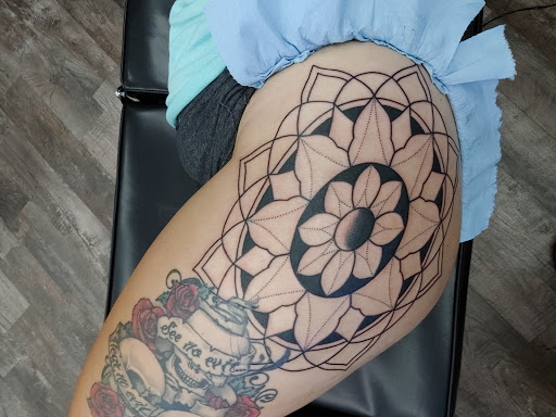 Explore cherry blossom tree tattoo ideas, creative tattoo ideas in Grand Forks, available at Blaq Taffy Tattoo