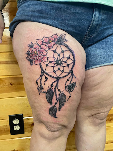 Explore bicep tattoo ideas for men, creative tattoo ideas in Foley, available at Symbolic Ink Tattoo Studio