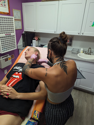 Explore kid name tattoo ideas, creative tattoo ideas in Houston, available at The Neon Jackal Tattoo