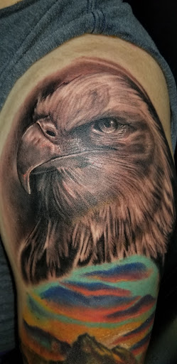 Explore farm tattoo ideas, creative tattoo ideas in Angola, available at Hoodlum Ink