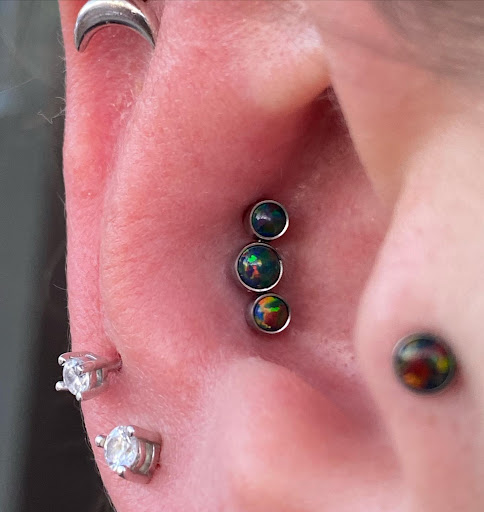 Explore tattoo ideas for aquarius, creative tattoo ideas in Dover, available at Agap Body Piercings