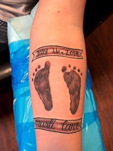 Explore tattoos on face ideas, creative tattoo ideas in Seymour, available at American Gypsy Tattoo Corp.