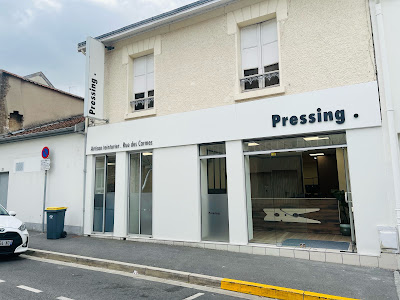 Pressing . à Reims