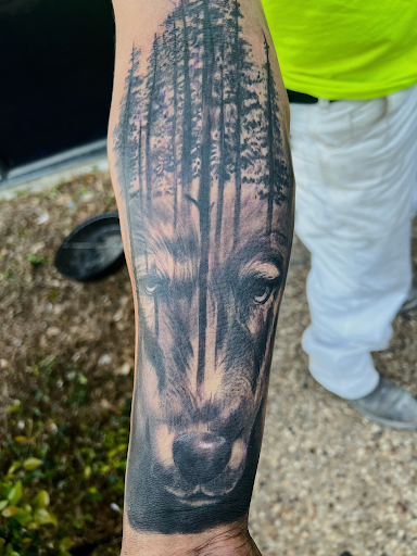 Explore tattoo ideas for men's shoulders, creative tattoo ideas in Dallas, available at Empire barbers & Ink