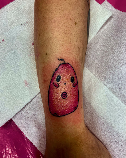 Explore demon slayer sword tattoo ideas, creative tattoo ideas in Lake City, available at Crooked Spines Tattoo Studio