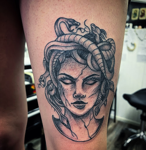 Explore fighter tattoo ideas, creative tattoo ideas in Madera, available at Sea Wolf Tattoo
