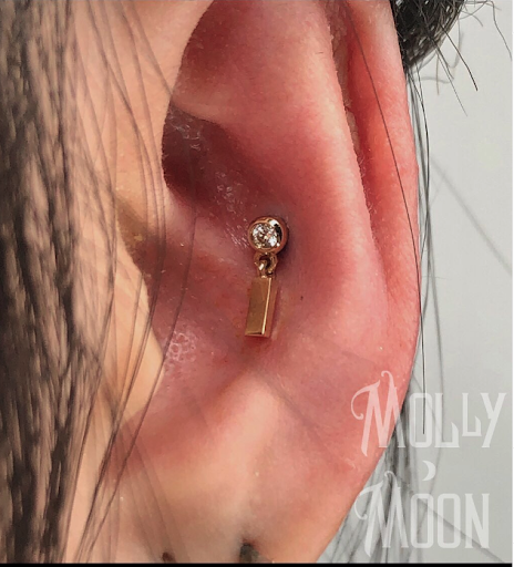 Explore tattoo ideas for family members, creative tattoo ideas in Oshkosh, available at Piercings by Molly Moon at 920 Tattoo and Piercing
