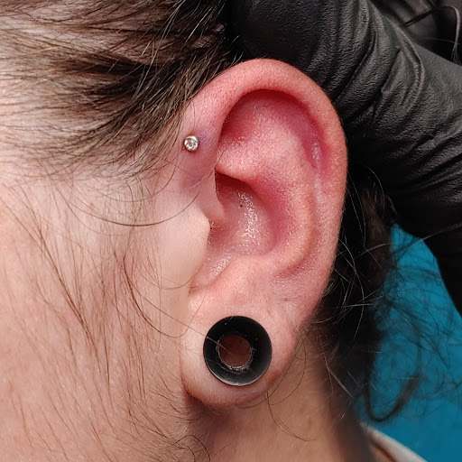 Explore alchemy tattoo ideas, creative tattoo ideas in San Marcos, available at Ollie the Impaler Body Piercing