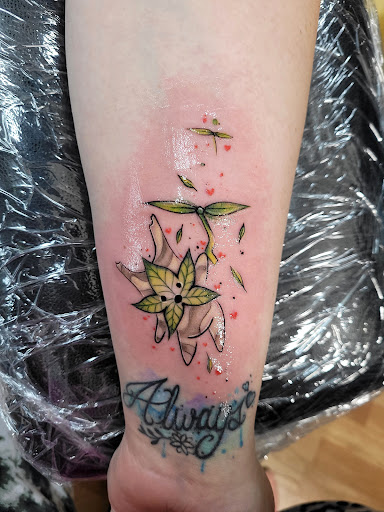 Explore swirl tattoo ideas, creative tattoo ideas in Benton, available at Spectrum Tattoo