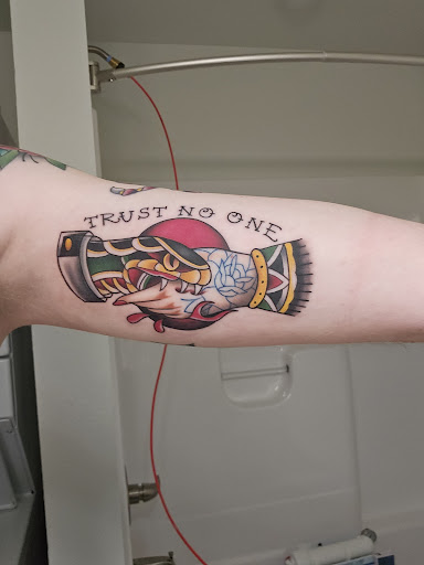 Explore latin tattoo ideas, creative tattoo ideas in Johnston, available at Obsidian Tattoo