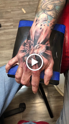 Explore snowboarding tattoo ideas, creative tattoo ideas in Crossville, available at Paragon Tattoos & Piercing