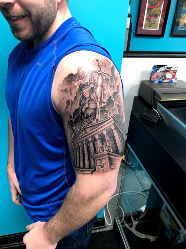 Explore small behind ear tattoo ideas, creative tattoo ideas in Lockport, available at Archer Ink Tattoo