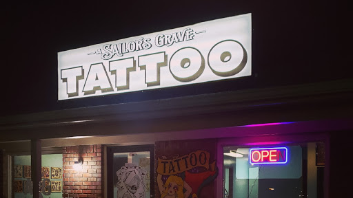 Explore gravestone tattoo ideas, creative tattoo ideas in Calhoun, available at A Sailors Grave Tattoo Parlor