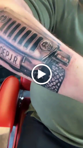 Explore red string tattoo ideas, creative tattoo ideas in San Diego, available at Wylde Sydes Tattoo & Body Piercing