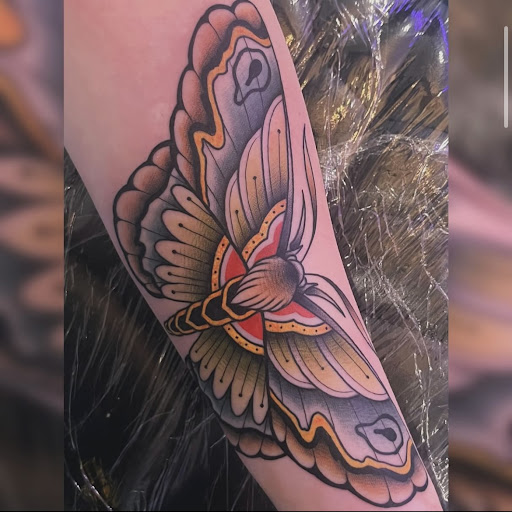 Explore roses tattoo ideas, creative tattoo ideas in Junction City, available at Patriot Tattoo Company