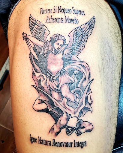 Explore tramp stamp lower back tattoo cover up ideas, creative tattoo ideas in Reno, available at Evolution Tattoo