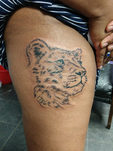 Explore rose tattoo idea, creative tattoo ideas in Spartanburg, available at The Gallery Tattoo Shop Spartanburg