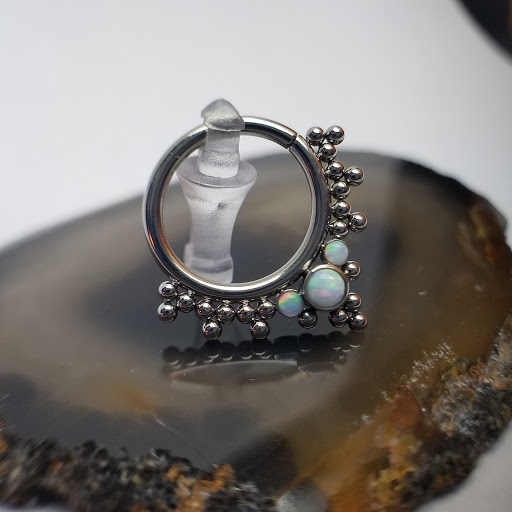 Explore cover up tattoo ideas for females, creative tattoo ideas in Baton Rouge, available at Deja Vu Piercing Studio