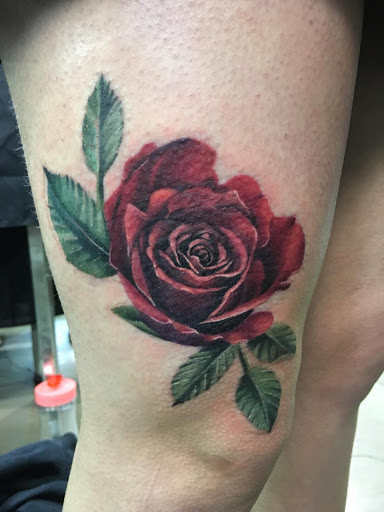 Explore tiny couple tattoo ideas, creative tattoo ideas in Chapel Hill, available at Golden Falcon Tattoo and Piercing