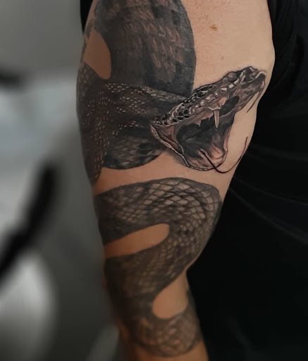 Explore rip tattoos ideas, creative tattoo ideas in Olympia, available at Sorry Mom Ink Tattoos & Piercings Olympia