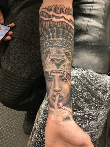 Find tattoo ideas crown for your next unique tattoo in Cape Canaveral at Neo Ronin Dojo