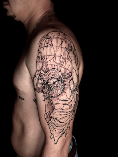 Explore hip thigh tattoo ideas, creative tattoo ideas in Norcross, available at Brotherhood Tattoo
