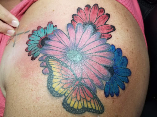 Explore hand mens tattoo ideas, creative tattoo ideas in Canon City, available at Royal Gorge Custom Tattoos & Piercings LLC